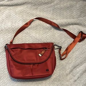 Medium mulled wine color lululemon crossbody bag